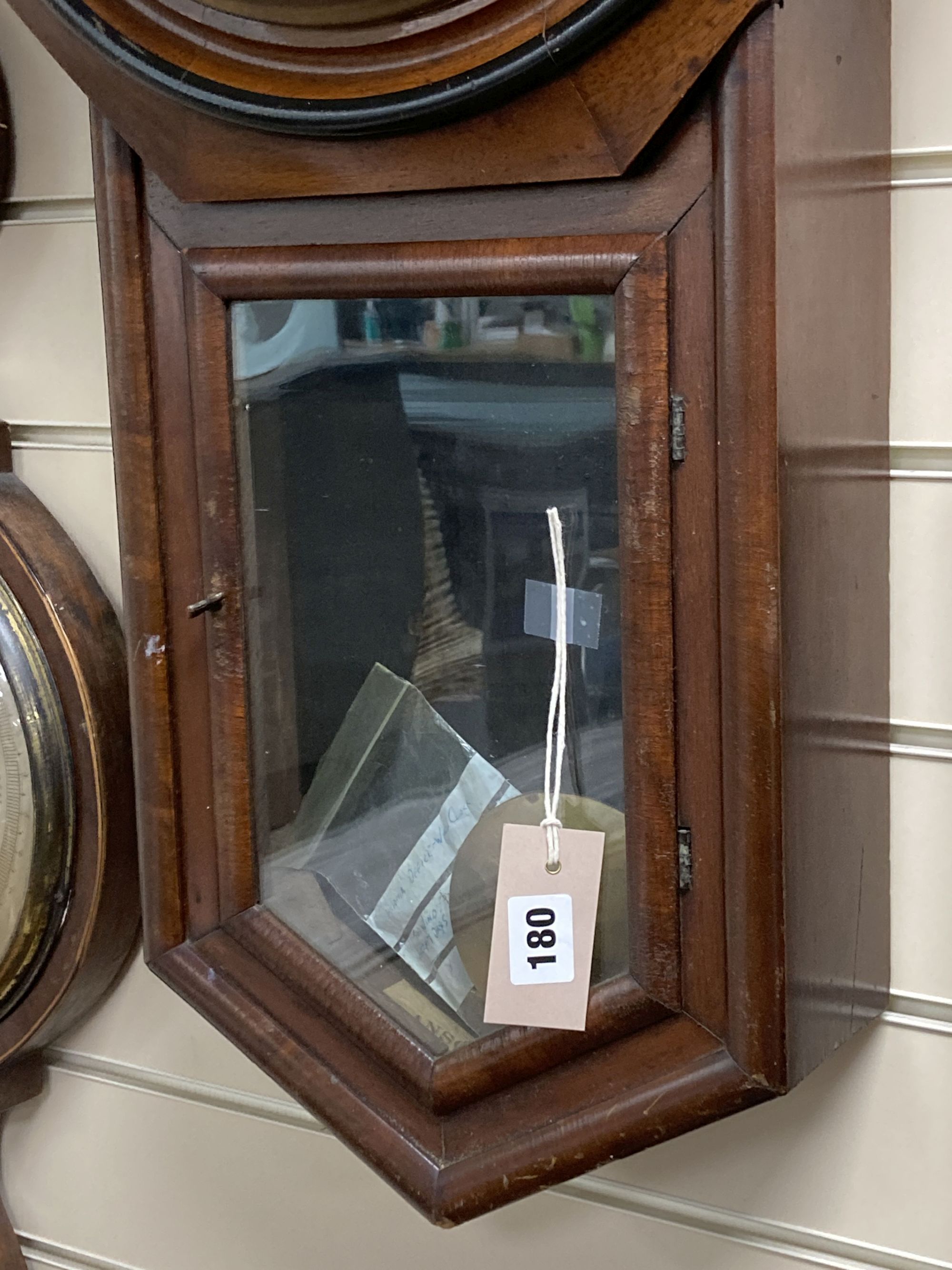 A 19th century American wall clock, height 80cm